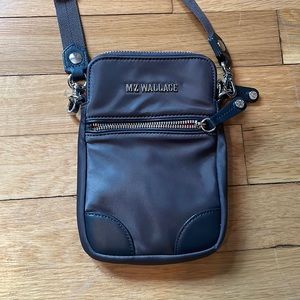 Mz Wallace cross body bag.  Used once.  Perfect condition.   Grey with silver.